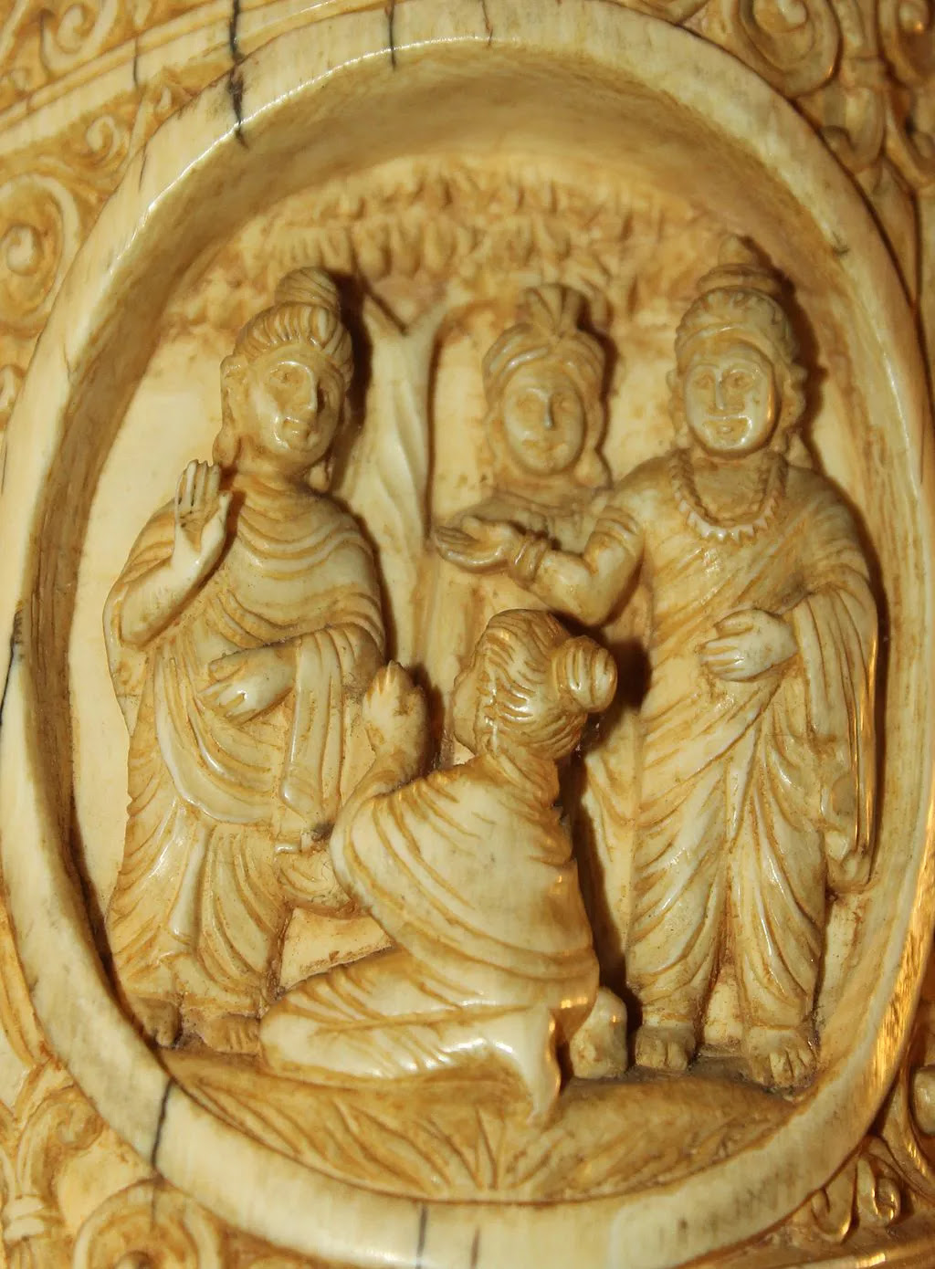 Carving of Buddha and some of his diciples.
