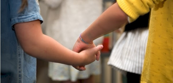 Children holding hands