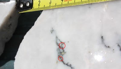 Figure 5 - HVD006 Visible gold within sulphides from interval 151.5  151.9m downhole (CNW Group/E79 Resources Corp.)