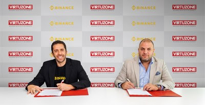 Nadeem Ladki, Executive Director of Business Development and  Strategic Partnerships at Binance, and George Hojeige, Chief Executive Officer of  Virtuzone, sign agreement for the integration and implementation of Binance Pay within Virtuzone’s operational and services infrastructure.