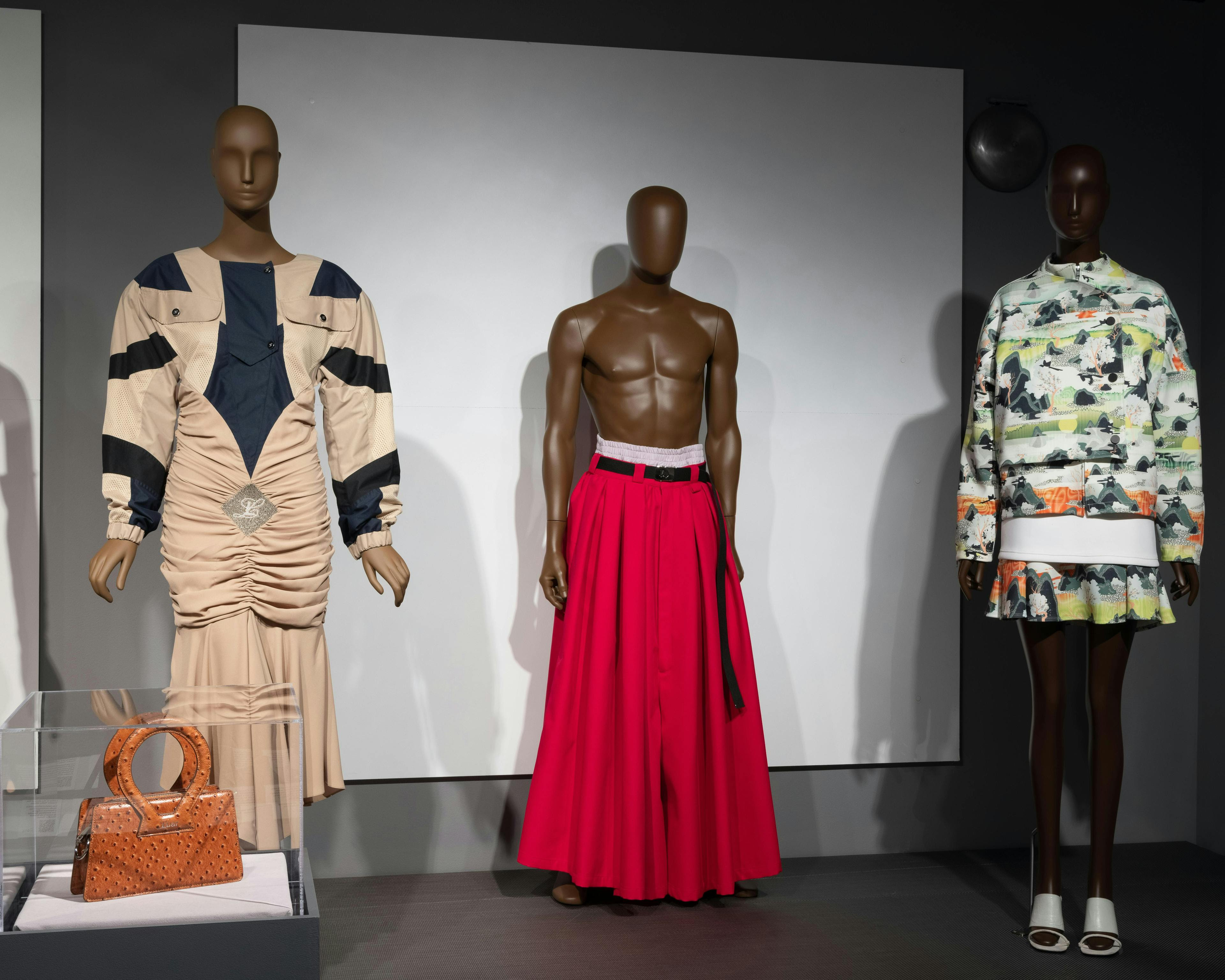 ¡moda hoy! latin american and latinx fashion design today exhibition installation fashion & textile history gallery the museum at fit adult female person woman bag handbag fashion high heel shoe mannequin