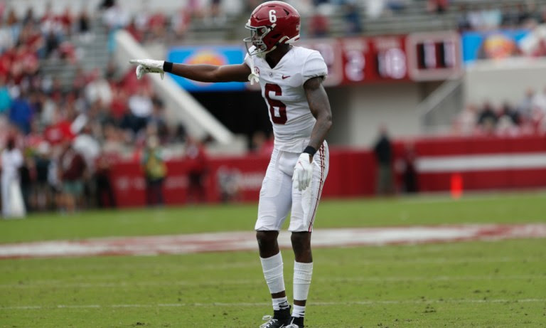Alabama DB Khyree Jackson (#6) giving out signals in 2022 A-Day Game