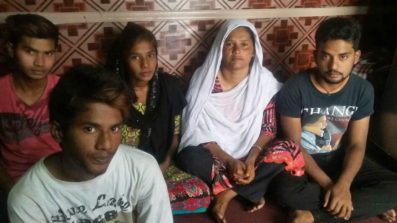 Noman Masih's mother, Khalida Bibi, with her other children. (Morning Star News)