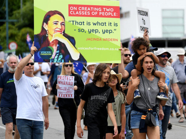 Members of the public take part in a protest organized by the Freedom and Rights Coalition in Christchurch, New Zealand on February 19, 2022 demanding an end to Covid-19 restrictions and mandatory vaccination. (Photo by Sanka Vidanagama/NurPhoto via Getty Images)