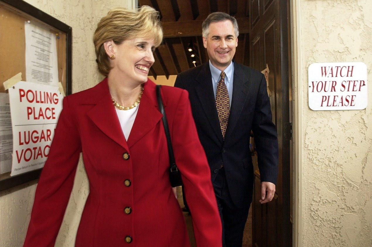 A photo shows Lori McClintock and her husband, Tom McClintock, leaving after casting ballots.