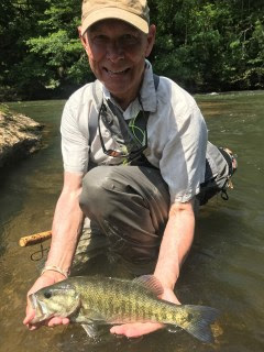 Angler with shoal bass