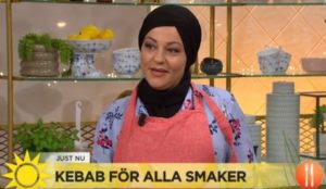 Swedish TV features “traditional” midsummer celebration: woman in hijab cooking kebab