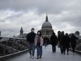 People wearing face masks walk across the Millennium footbridge backdropped by the dome of St Paul&#39;s Cathedral in London, Tuesday, March 10, 2020. Starkly illustrating the global east-to-west spread of the new coronavirus, Italy began an extraordinary, sweeping nationwide travel ban on Tuesday while in China, the diminishing threat prompted the president to visit the epicenter and declare: &quot;&quot;We will certainly defeat this epidemic.&quot; (AP Photo/Matt Dunham)