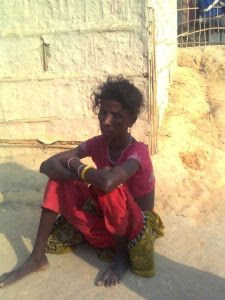 Lakhi Sabor, wife of Giridhari Sabor of Boali area in the garden. She is very weak and has low appetite and low vision.