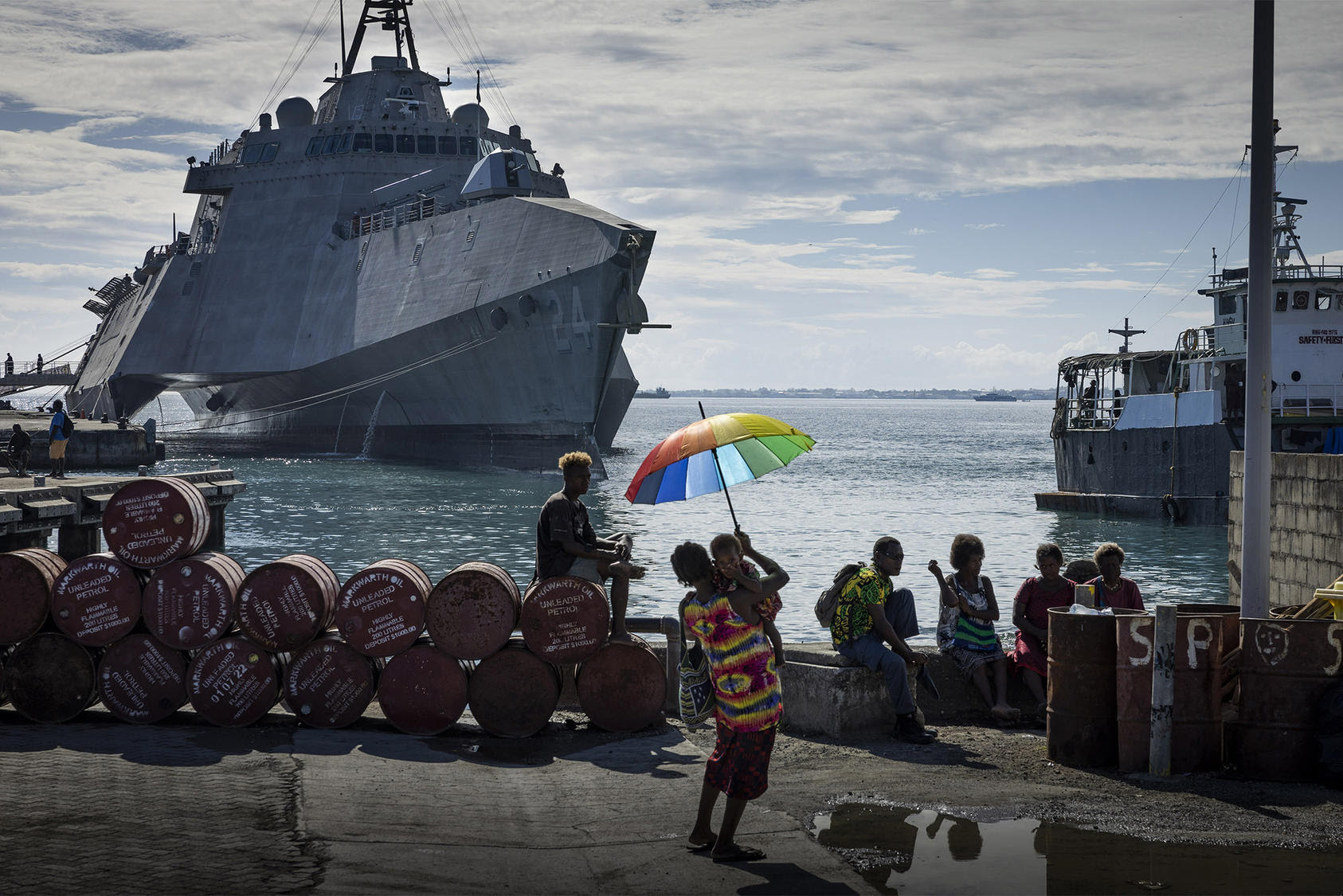 U.S. combat ship Oakland stationed by the harbor in Honiara, Solomon Islands, on Sunday, Aug. 7, 2022, where a memorial service commemorated the 80th anniversary of a crucial battle in the Pacific. (Matthew Abbott/The New York Times) 