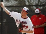 Washington Nationals pitcher Erick Fedde throws a bullpen session during spring training baseball practice Monday, Feb. 17, 2020, in West Palm Beach, Fla. (AP Photo/Jeff Roberson) **FILE**