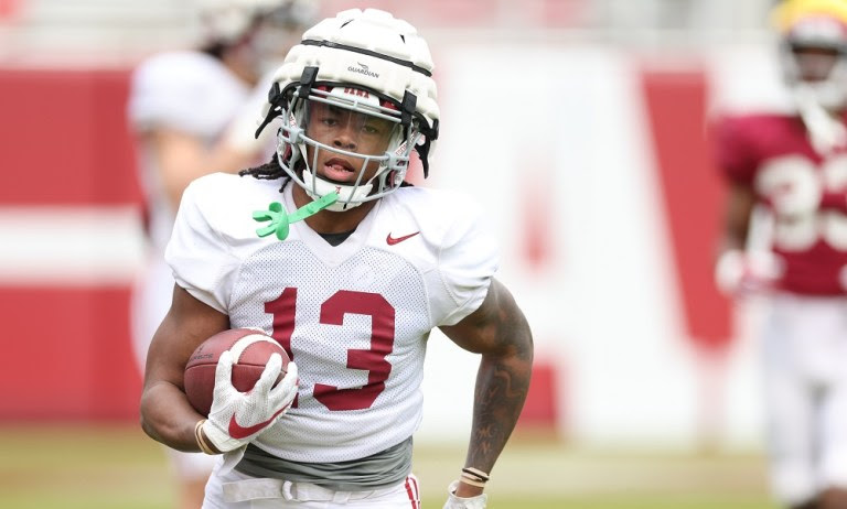 Alabama RB Jahmyr Gibbs (#13) runs with the ball in 2022 spring scrimmage