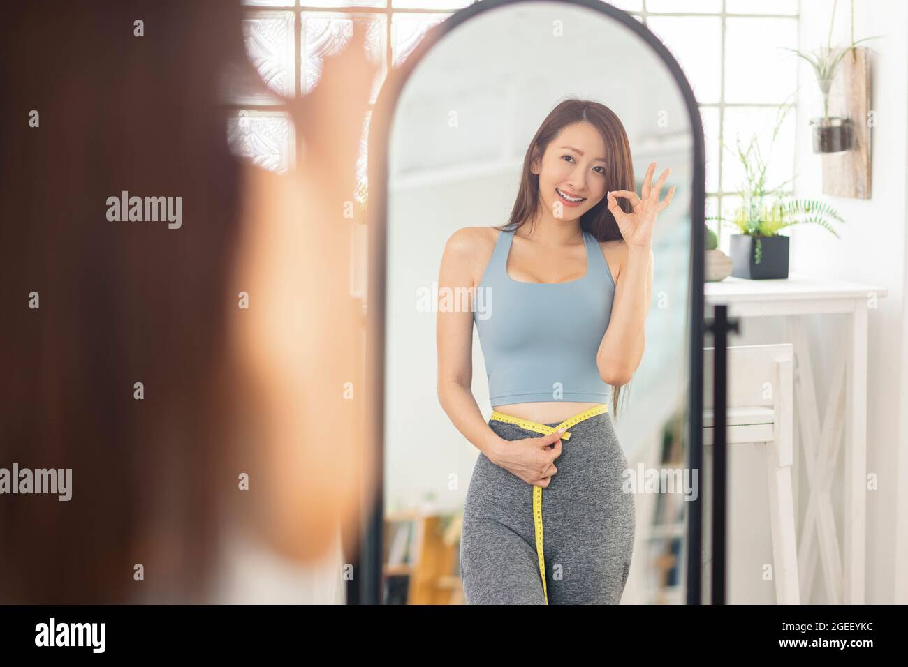 Dieting woman mirror hi-res stock photography and images - Alamy