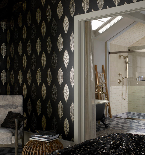 Classy gold and black design flows into bathroom. 