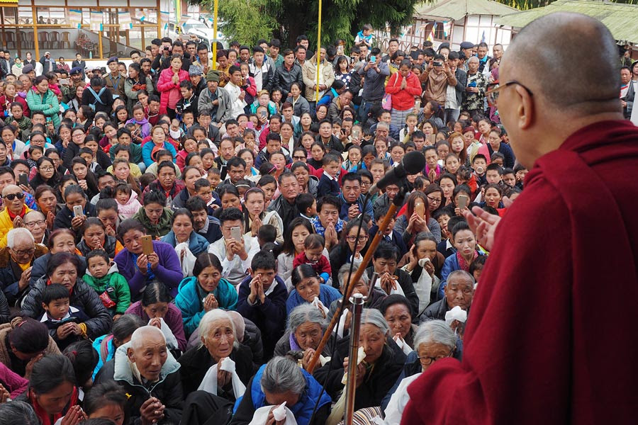 click for large image Tibetan spiritual leader Dalai Lama speaking to members of the local community gathered to greet him at Tenzingang Tibetan Settlement in Arunachal Pradesh, India, on 4 April 2017.
