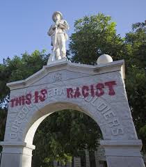 These photos of vandalized Confederate monuments show the battle ...