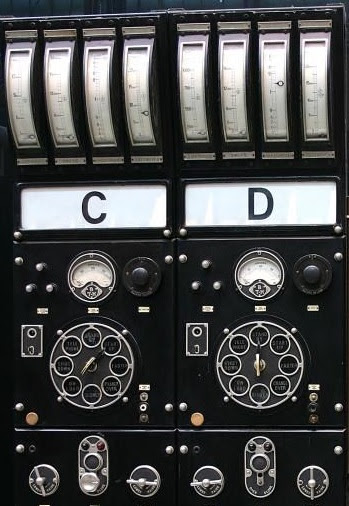 A complex control panel with various dials and two sections labelled C and D