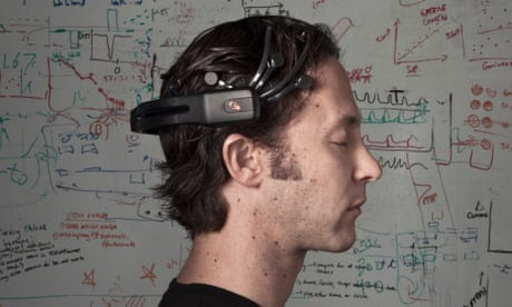 david eagleman in profile in front of diagrams and writing on a whiteboard, houston, texas