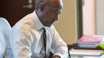 Chancellor Gary S. May at his desk