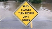 Road sign telling drivers to Turn Around, Don't Drown