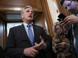 House Minority Leader Kevin McCarthy, R-Calif., assures reporters that a bipartisan coronavirus aid package deal between House Speaker Nancy Pelosi and the Trump administration will get a vote, on Capitol Hill in Washington, Friday, March 13, 2020. (AP Photo/J. Scott Applewhite)