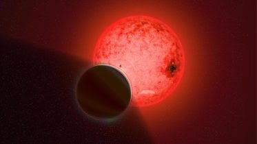 Large Gas Giant Planet Orbiting Small Red Dwarf Star
