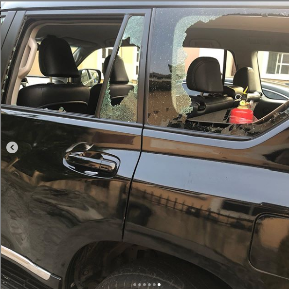 Xenophobia: Lady shares photos of injuries she sustained and damages done to her car after being attacked in Lagos protest