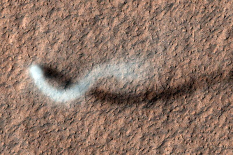 A towering dust devil in the late-spring afternoon, Amazonis Planitia region of northern Mars.