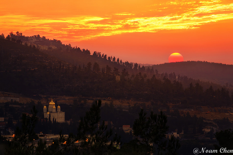 sunset above the hills of ein karem shining on a church, jerusalem