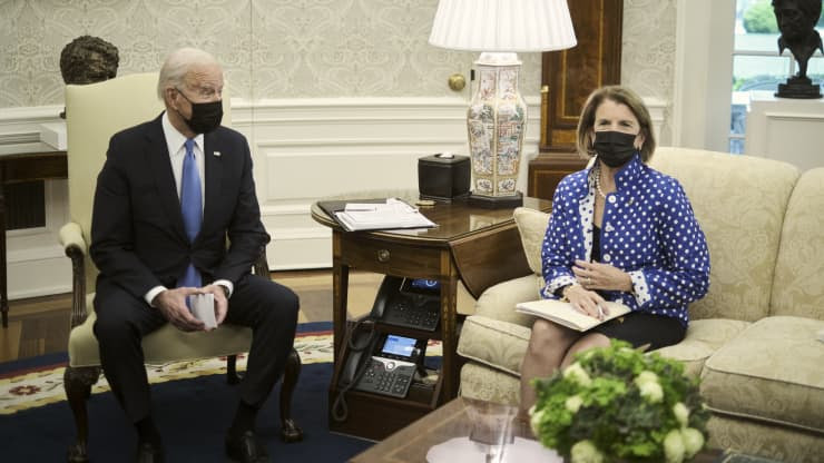President Joe Biden and Senator Shelley Moore Capito sit in the Oval Office together 