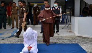 Sharia in action in Indonesia: Woman collapses after receiving 100 lashes for premarital sex