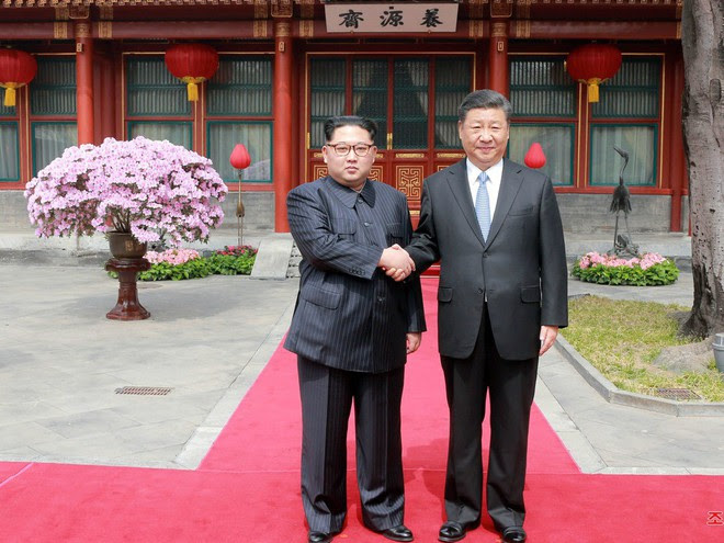 KCNA công bố loạt ảnh mãn nhãn về chuyến thăm Trung Quốc của nhà lãnh đạo Kim Jong-un - Ảnh 8.