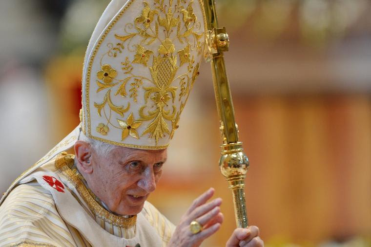 This file picture taken on January 6, 2013 shows Pope Benedict XVI blessing faithful at the end of the Epiphany mass in St. Peter's Basilica in Vatican City. Pope Benedict XVI on February 11, 2013 announced he will resign on February 28, a Vatican spokesman told AFP.