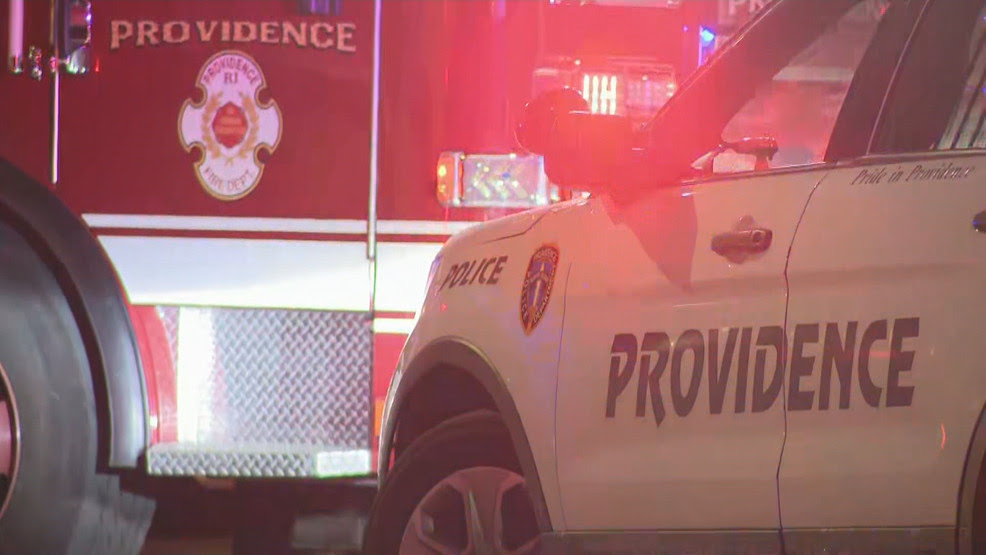  Police: Car hits pedestrian, pole in Providence