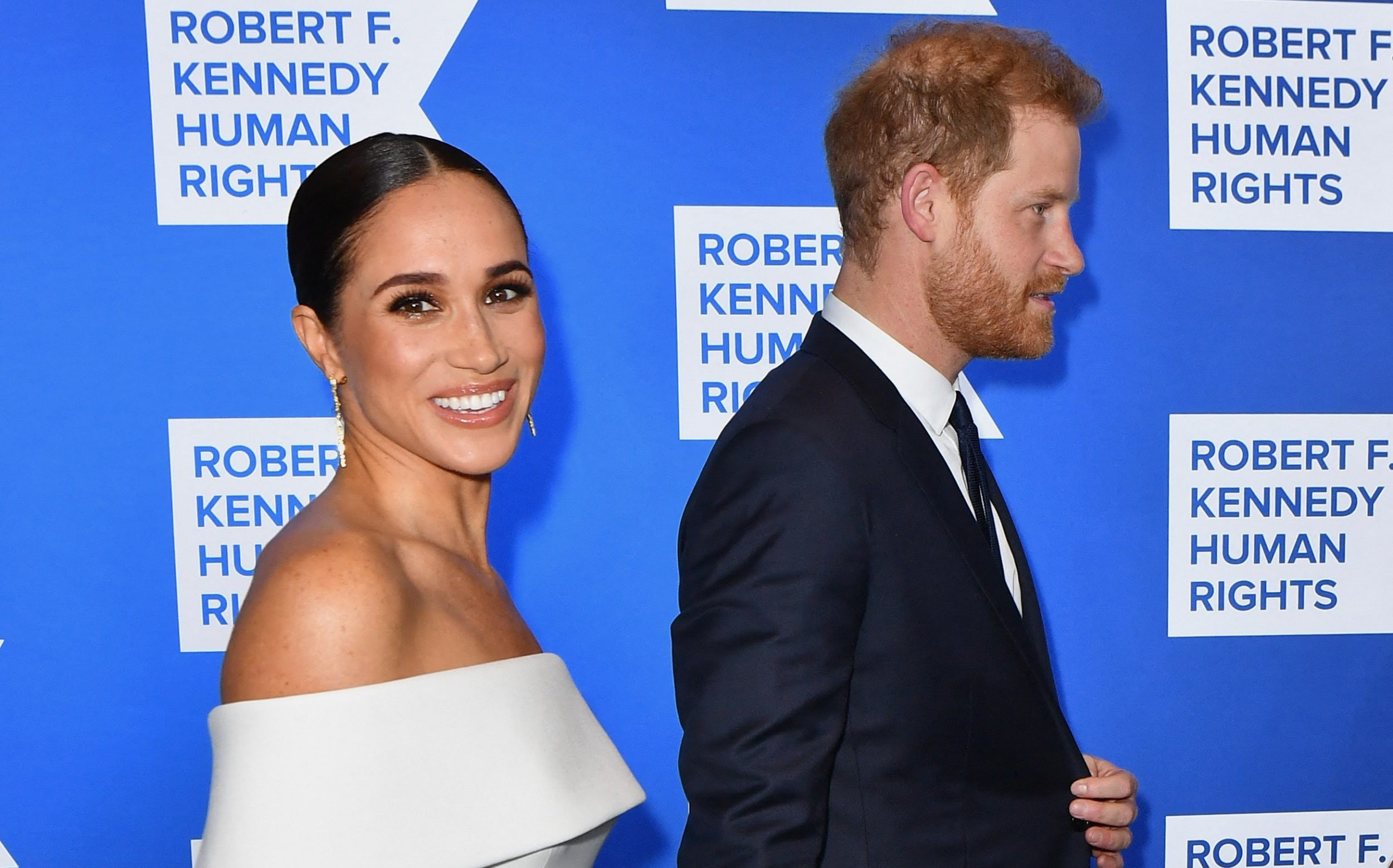 The Sussexes at the Robert F Kennedy human rights awards. Meghan smiles at the camera