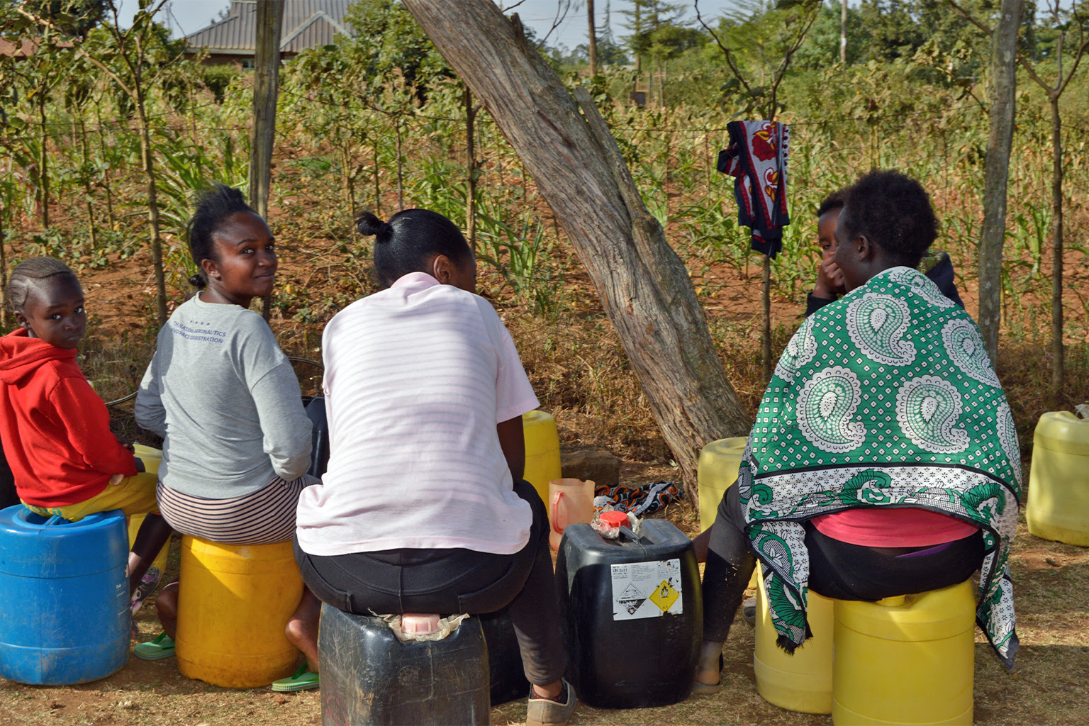 Every woman at the water point had at least four containers.