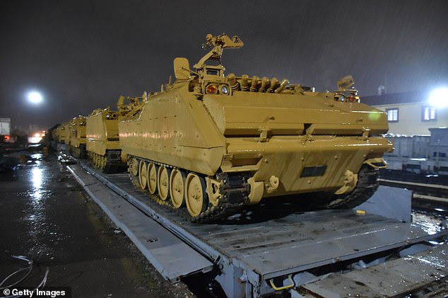 Russia has told Turkey to let the Syrian government take back areas vacated by US troops with Ankara preparing to clear Kurdish fighters from a town in the war-torn country. Pictures have emerged today showing Turkish armoured military vehicles (pictured) and troop carriers being dispatched to the border with Syria today