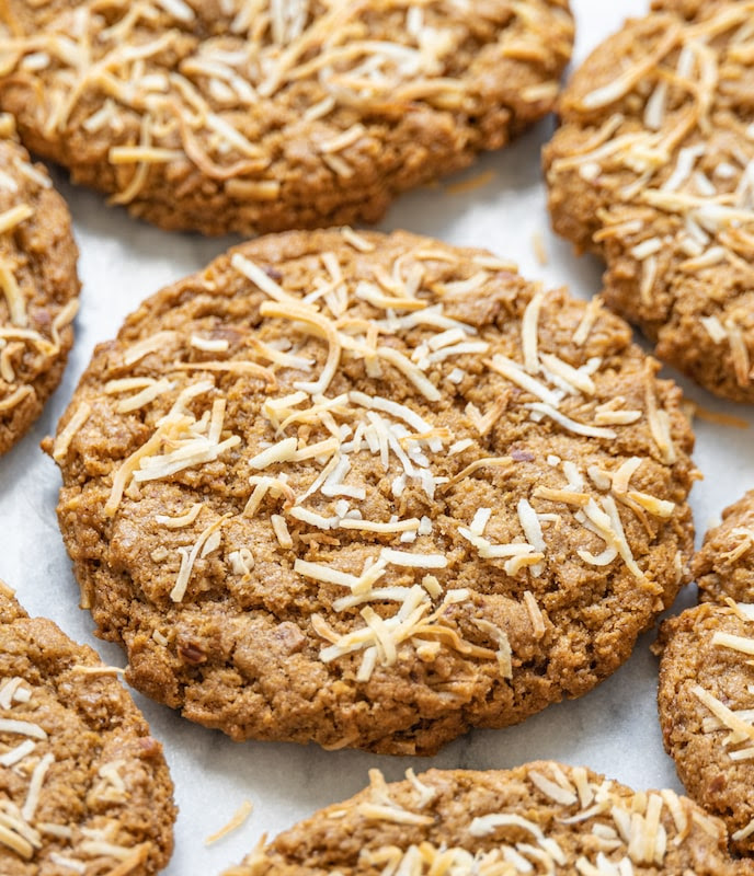 Cookies with toasted coconut shreds on top.