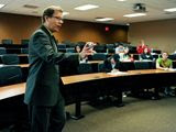 John Bitzan teaching at North Dakota State University, where he is the director of the Sheila and Robert Challey Institute for Global Innovation &amp; Growth. (Photo courtesy of Mr. Bitzan)
