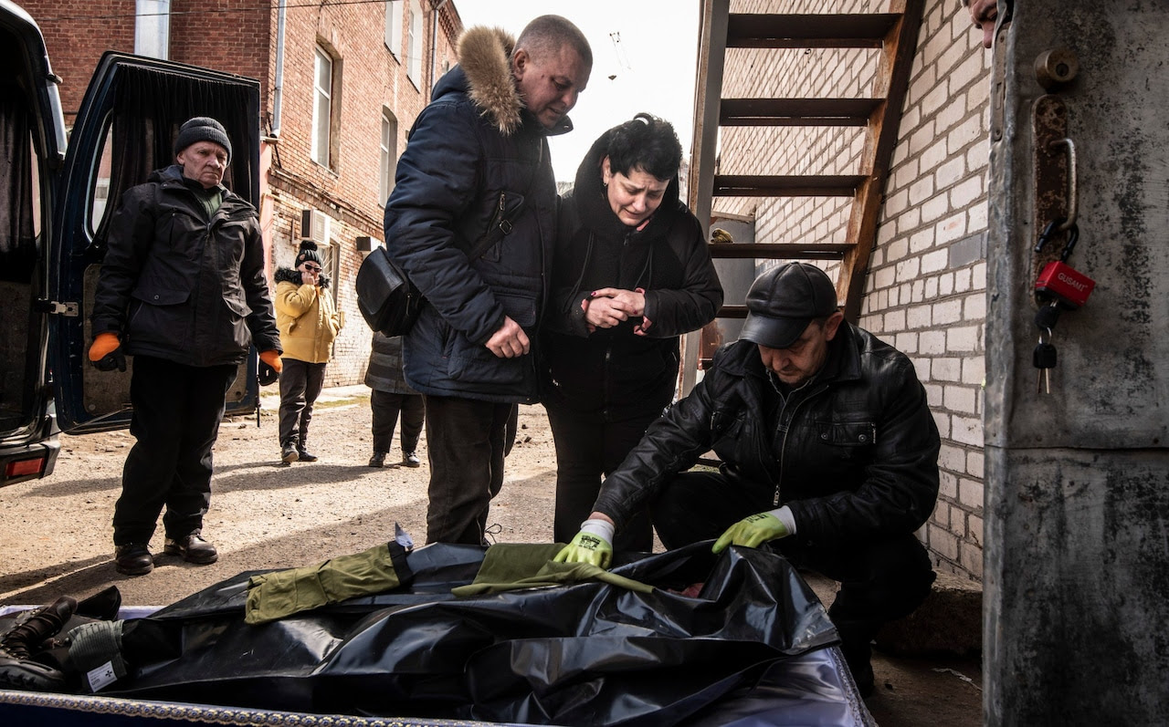Irina is shown the body of her 22-year-old son outside a crammed mortuary in Mykolayiv