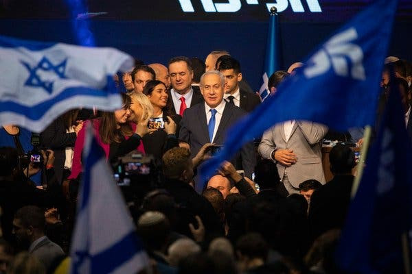 Prime Minister Benjamin Netanyahu, center, in March after failing for the third time in a year to win a new term outright in elections in Israel.