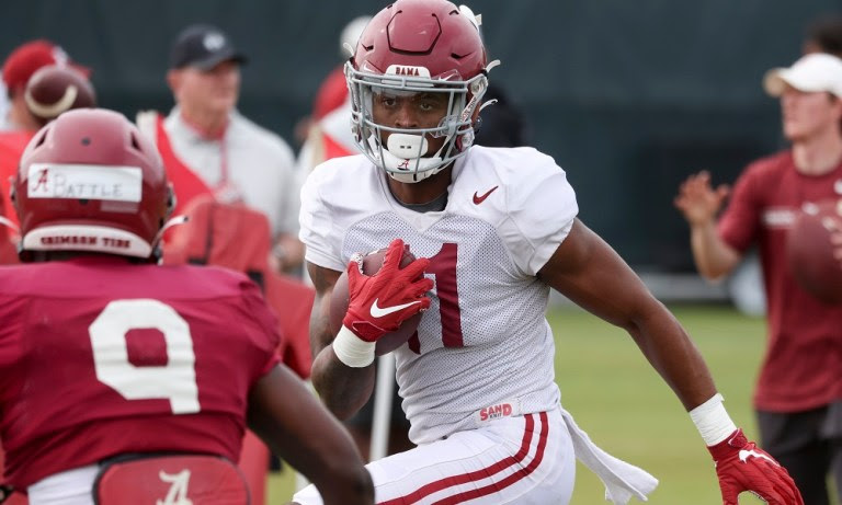 Alabama WR Traeshon Holden (#11) runs with the ball during 2022 Spring Football Practice