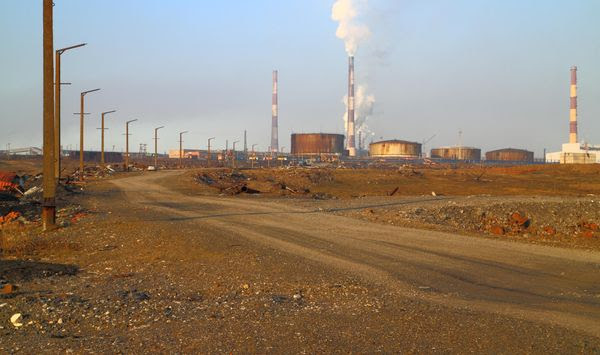 This handout photo provided by Vasiliy Ryabinin shows oil storage tanks outside Norilsk, 2,900 kilometers (1,800 miles) northeast of Moscow, Russia, Friday, May 29, 2020. Russian authorities have charged Vyacheslav Starostin, the director of an Arctic power plant that leaked 20,000 tons of diesel fuel into the ecologically fragile region on May 29, 2020, with violating environmental regulations. An investigation is ongoing into the alleged crime, that could bring five years in prison if Starostin is found guilty. (Vasiliy Ryabinin via AP)