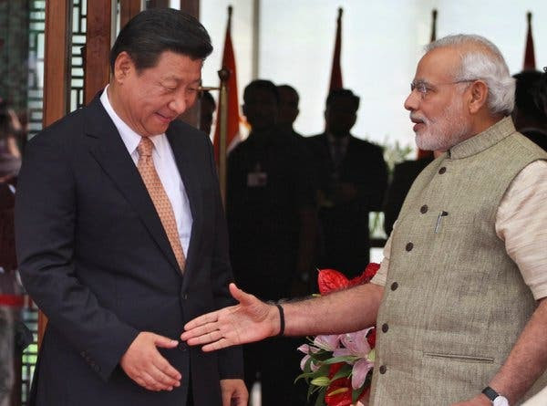 Prime Minister Narendra Modi of India, right, welcoming President Xi Jinping of China upon his arrival in Ahmadabad, India, last year.