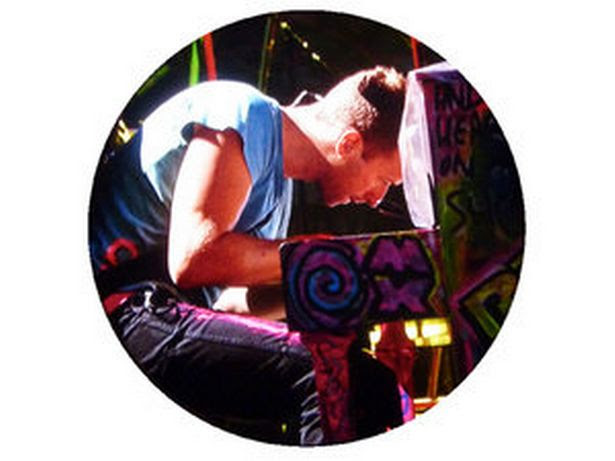 Chris Martin from Coldplay on the stage designed by Paris
