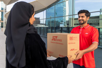 A J&T Express courier delivers a parcel to a resident in Saudi Arabia A J&T Express courier delivers a parcel to a resident in Saudi Arabia