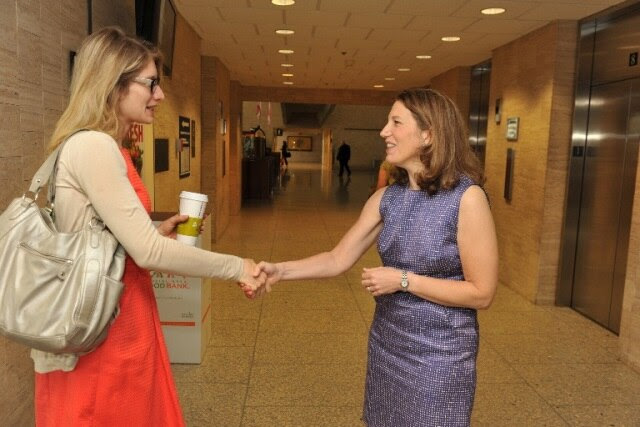 Secretary Burwell greets employees on her first day at HHS, June 9, 2014.