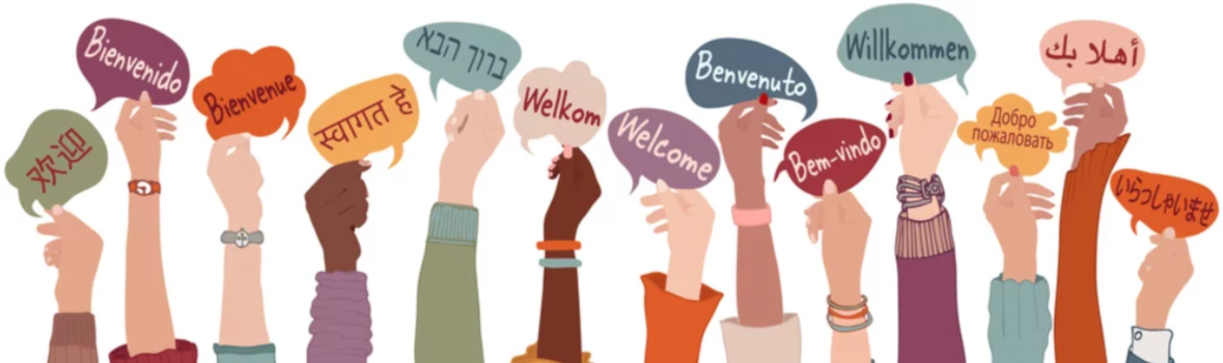 Many hands holding up signs printed with the word "welcome" written in many different languages
