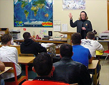 picture of a teacherin front of classroom