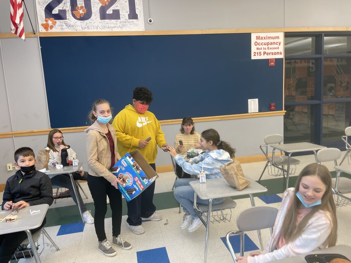 students enjoy ice cream treat